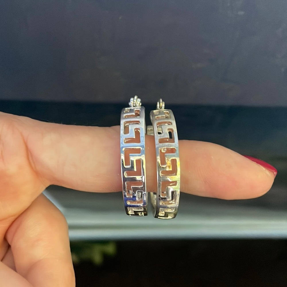 Slightly worn hoop earrings